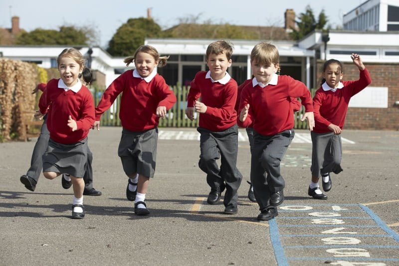 primary school children running